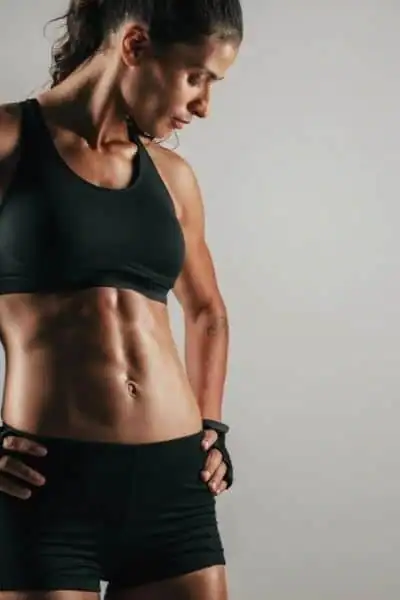 Toning Up at Home: The Ultimate Guide to Bodyweight Exercises 2 Image of woman's toned stomach after bodyweight exercises Stanmore and non-surgical treatment from Lipo 360