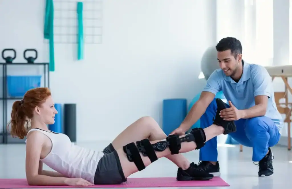 Woman having treatment to help muscle recovery Stanmore after an injury